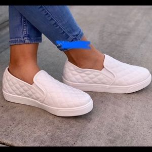 White quilted slip on sneakers